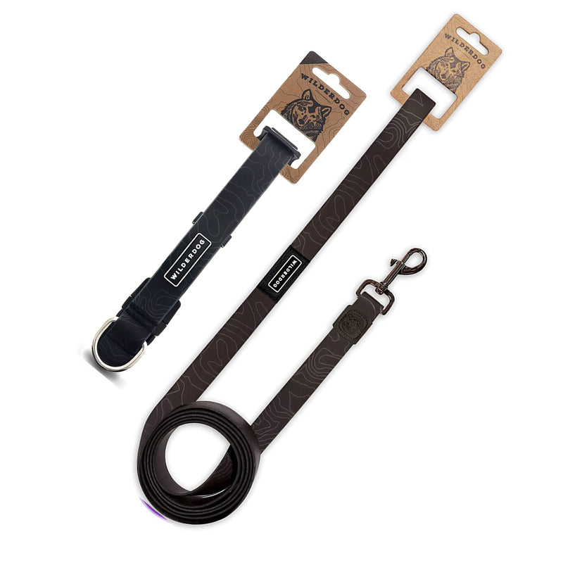 The Black Waterproof Leash + Collar Bundle features two durable black dog accessories with metal hardware and WILDWOOD tags, shown on a white background.