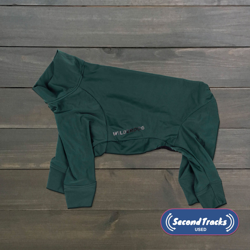 Used Powsuit dog jacket on wooden boards, “SecondTracks Used” logo visible in the bottom right.
