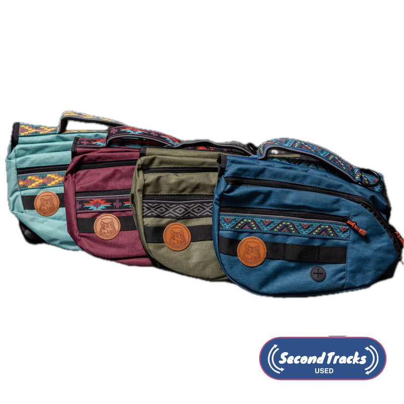 Backpack: Vibrant, round dog bag with patterned straps, leather accents & water-resistant design.