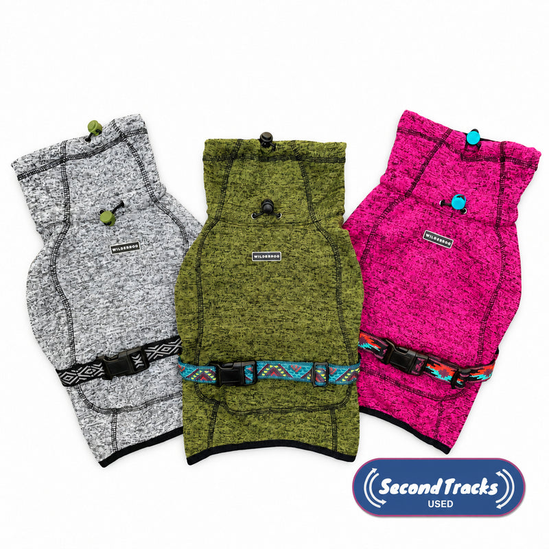 Three colored (Used) Fleece Jackets for dogs with harnesses by SecondTracks on a white background.