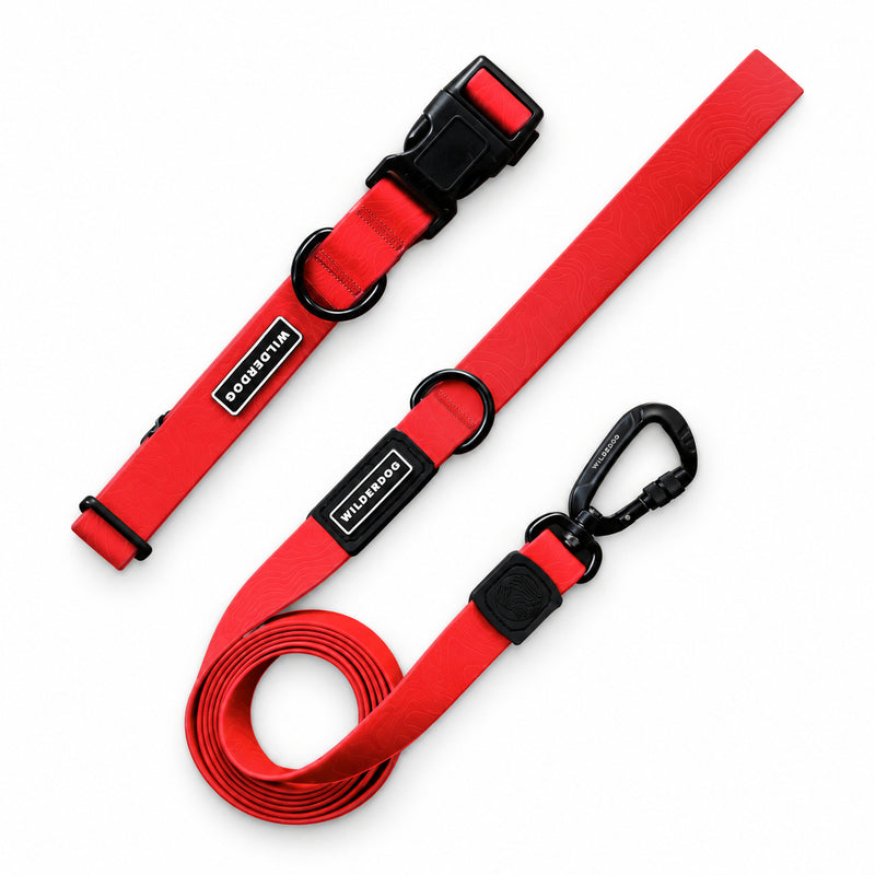 Red Waterproof Pro Leash + Collar Bundle with black hardware and logo labels, shown on a white background.
