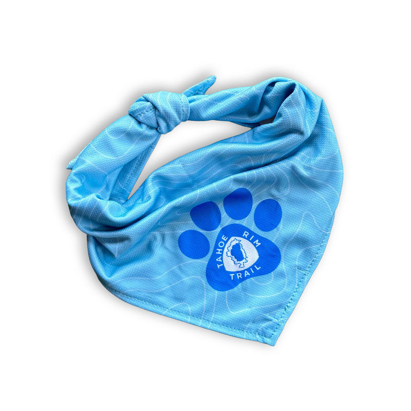 Tahoe Rim Trail Association Bandana in light blue with paw print—perfect hiking accessory for your dog.