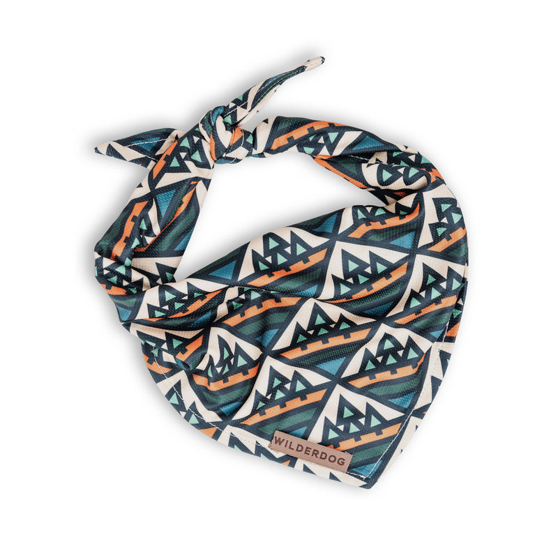 The Camp Bandana: a quick-drying blue, orange, and white mountain-pattern dog cooling accessory for stylish pups.