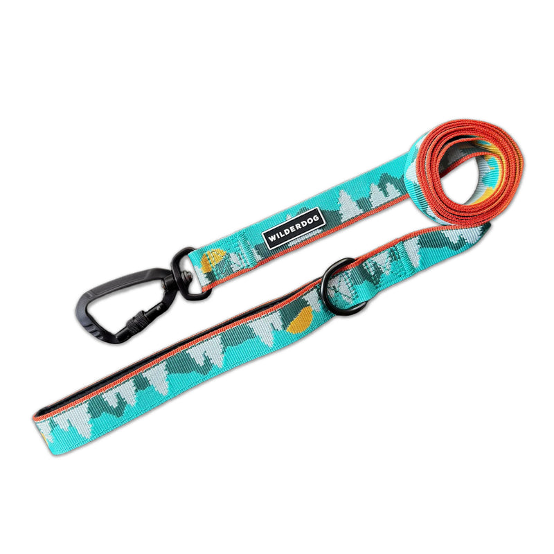 Tamarack Ultralight Leash: turquoise with mountain design, black clip, “Wilderdog” label on white background.