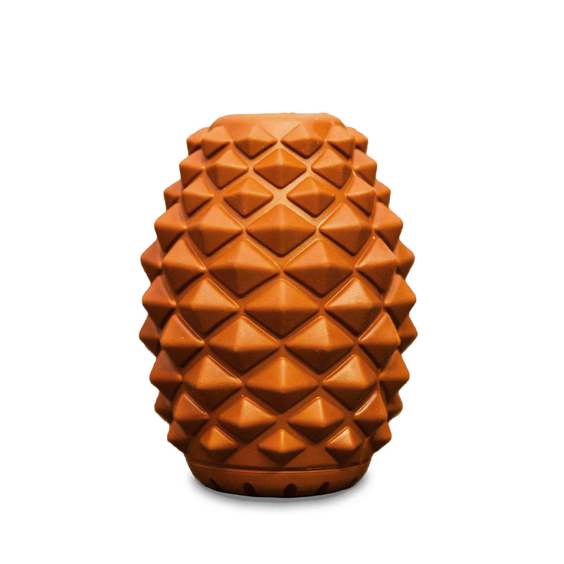 The Conifur: orange geometric vase with diamond patterns, resembles an interactive dog toy on white background.