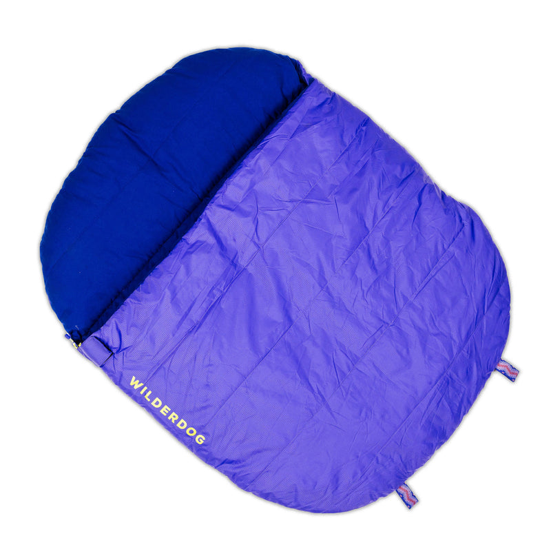 Water-resistant purple & blue Sleeping Bag with “WILDERDOG” in yellow on the bottom left corner for dogs.