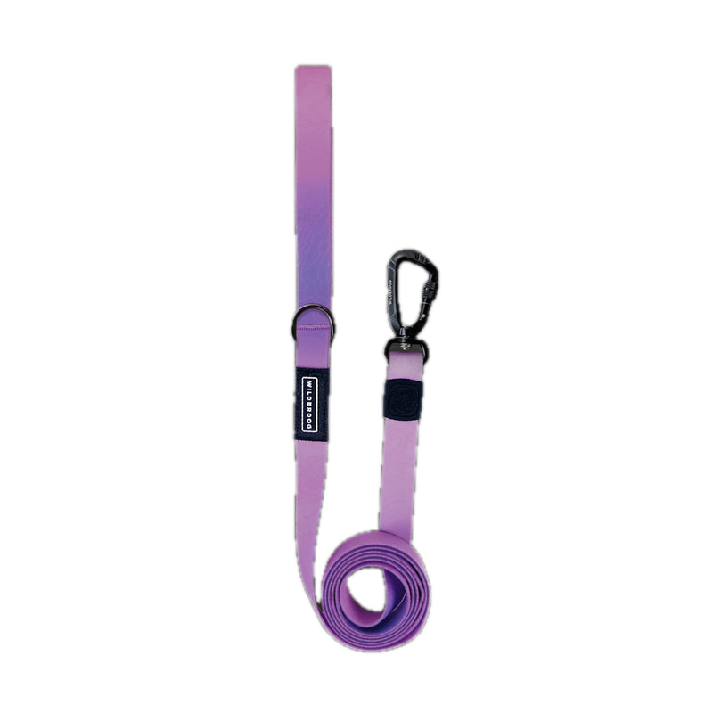 Aurora Waterproof Pro Leash in purple with metal clip, black label, coiled end, shown on a white background.